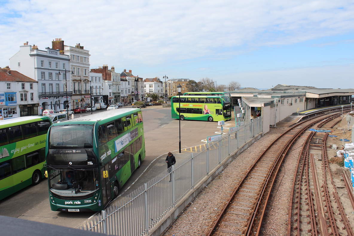 Photo showing the railway line at Ryde, Ryde bus station and the buildings along the Esplanade in the background