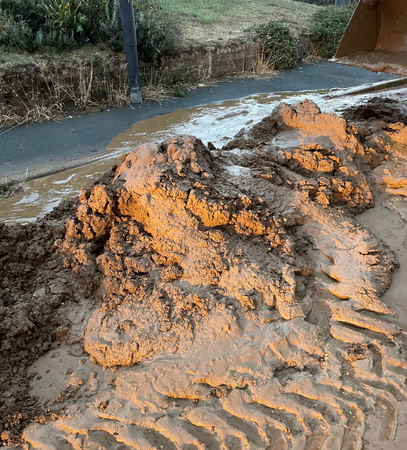 Mud on the highway during recent flooding in Arreton