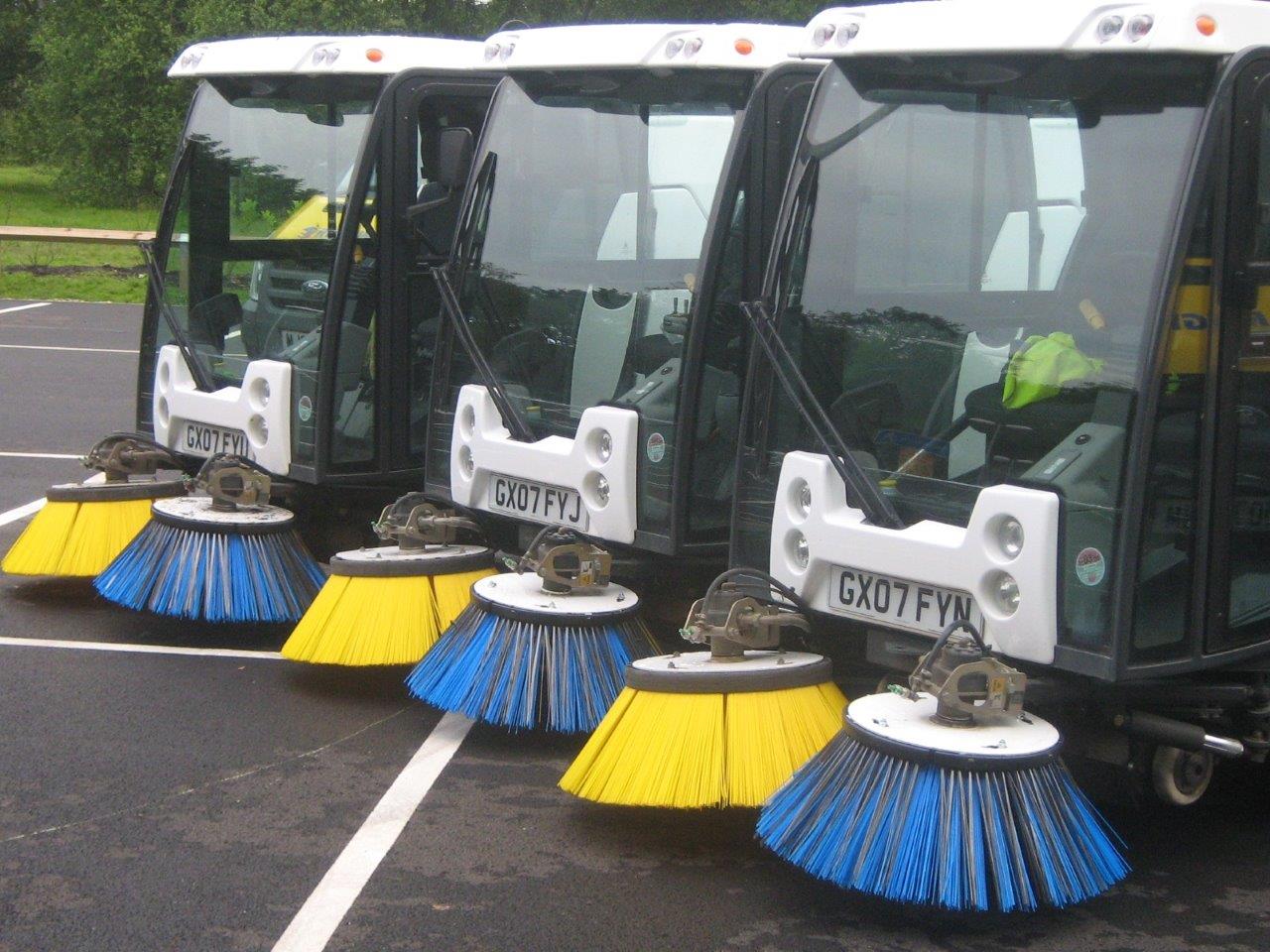 Picture showing three street cleansing vehicles