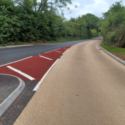 section of road with textured surface applied to help prevent skidding