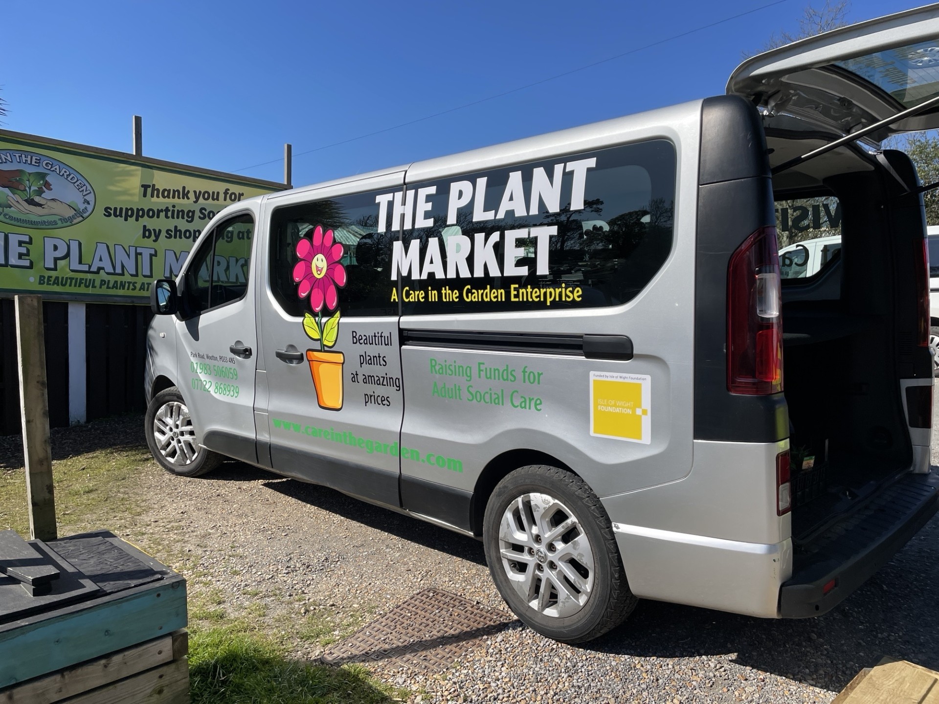 minibus with branding on the side - The Plant Market